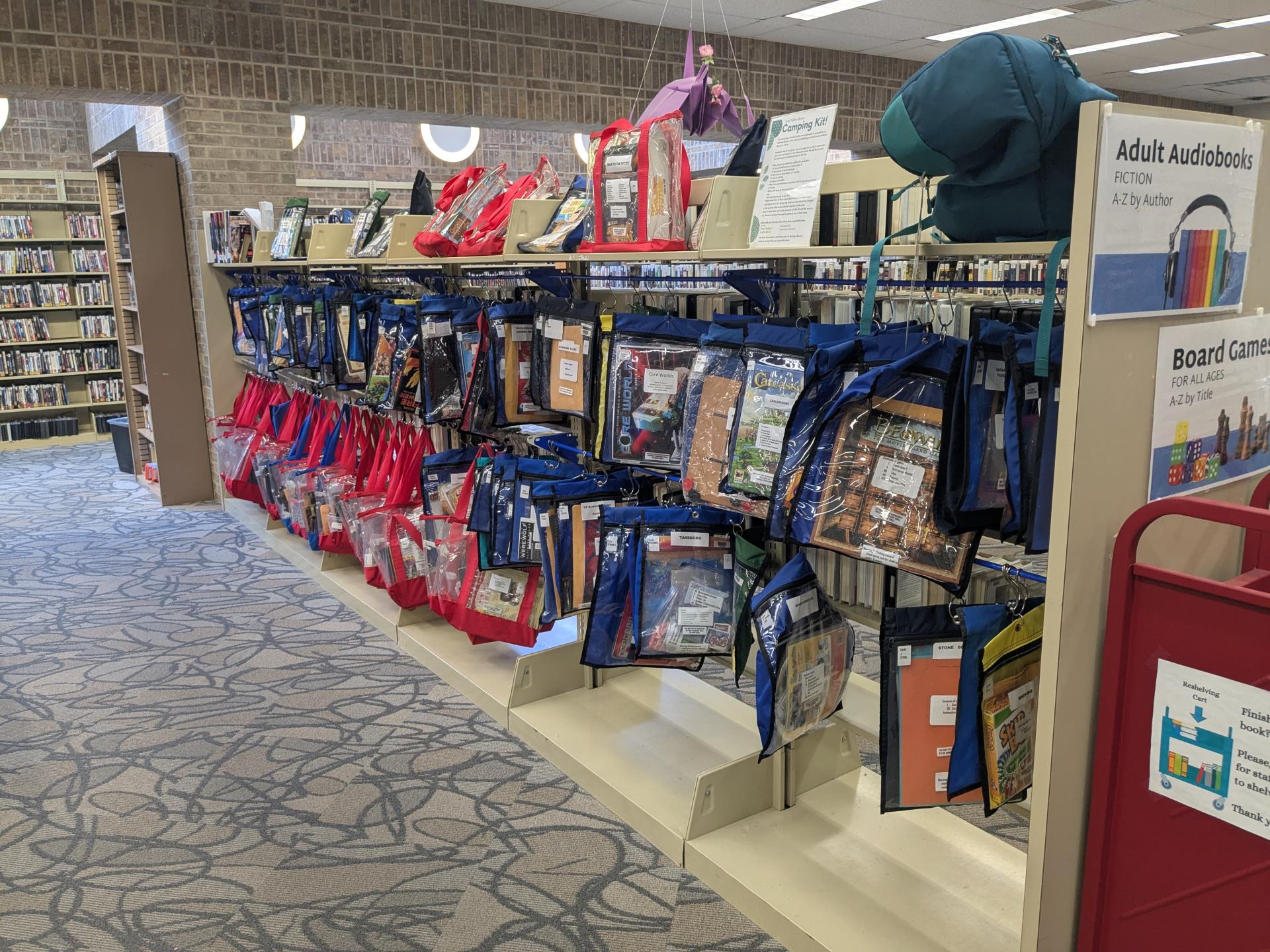 A picture depicting the myriad of board games available at the Tyler Library